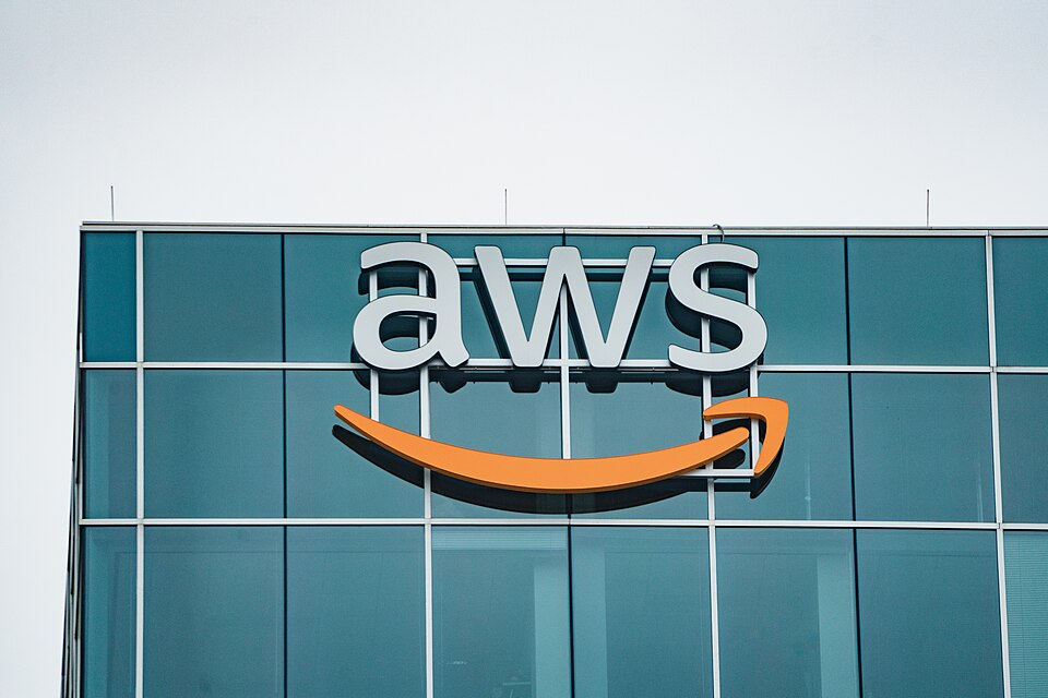 AWS logo signage on the exterior of an Amazon Web Services office building